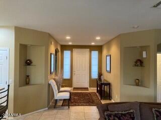 entryway featuring light tile patterned floors