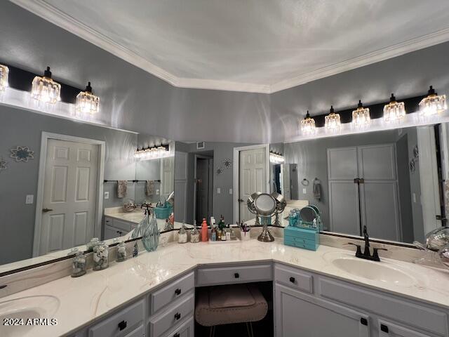 19014 N 91st Dr, Peoria, AZ 85382 - bathroom featuring double vanity and crown molding