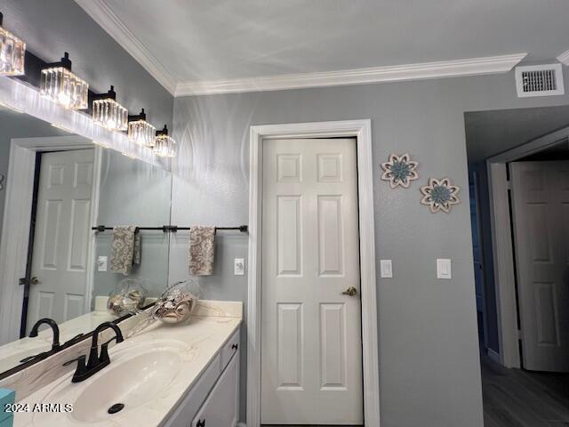 19014 N 91st Dr, Peoria, AZ 85382 - bathroom with ornamental molding and vanity