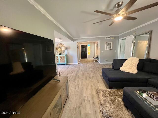 19014 N 91st Dr, Peoria, AZ 85382 - living room featuring ornamental molding, light wood-type flooring, ceiling fan, and baseboards