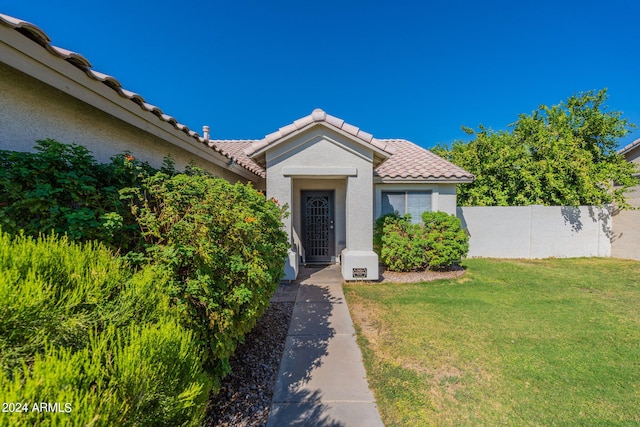 exterior space with a front yard