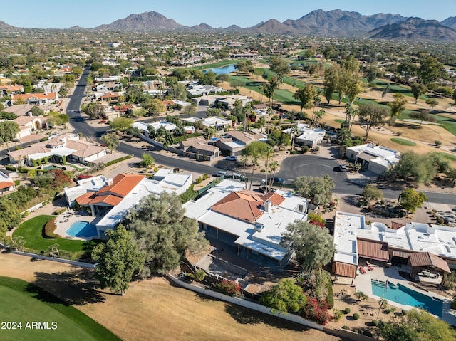 bird's eye view with a water and mountain view