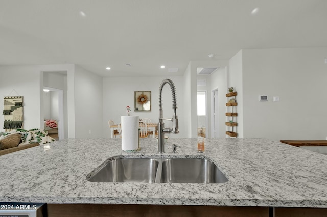 4714 W Nutmeg Ave, Coolidge, AZ 85128 - kitchen with open floor plan, recessed lighting, and light stone counters