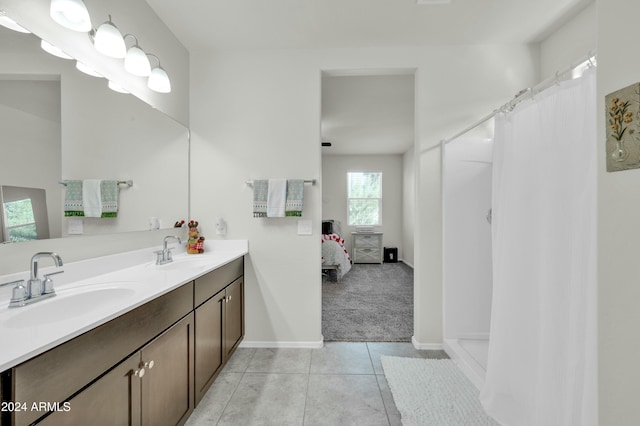 4714 W Nutmeg Ave, Coolidge, AZ 85128 - ensuite bathroom with double vanity, tile patterned floors, and a shower with curtain