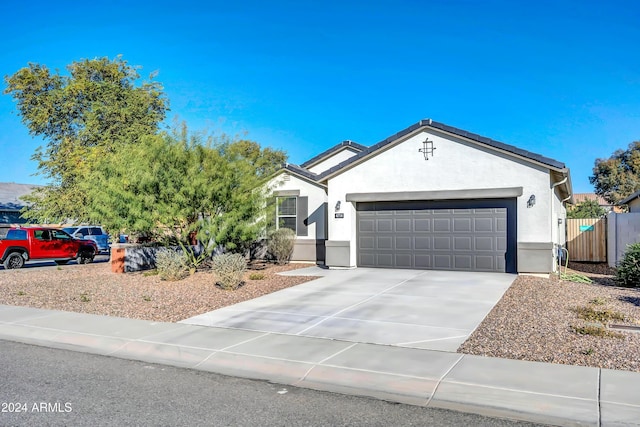4714 W Nutmeg Ave, Coolidge, AZ 85128 - single story home featuring a garage, stucco siding, and concrete driveway