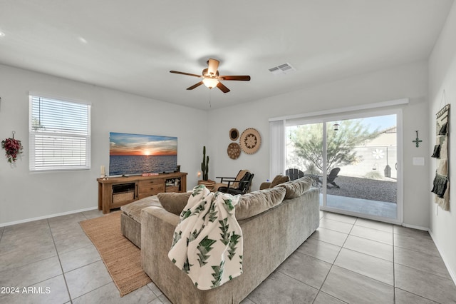 4714 W Nutmeg Ave, Coolidge, AZ 85128 - living room featuring light tile patterned floors and a ceiling fan
