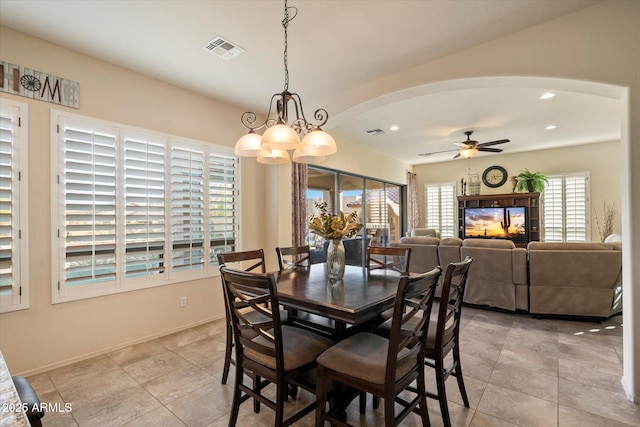 8733 E Jacaranda St, Mesa, AZ 85207 - dining room featuring recessed lighting, arched walkways, visible vents, and ceiling fan with notable chandelier