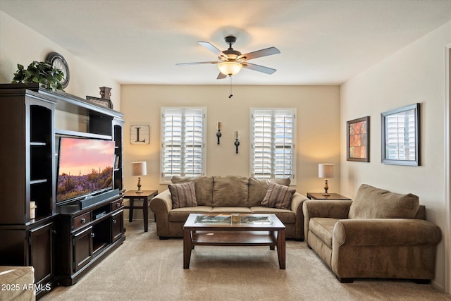 8733 E Jacaranda St, Mesa, AZ 85207 - living area with light carpet and a ceiling fan