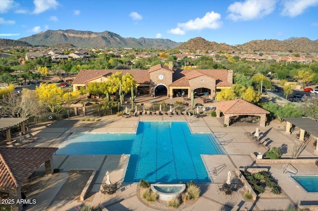 8733 E Jacaranda St, Mesa, AZ 85207 - pool with a patio area, a mountain view, a gazebo, and fence