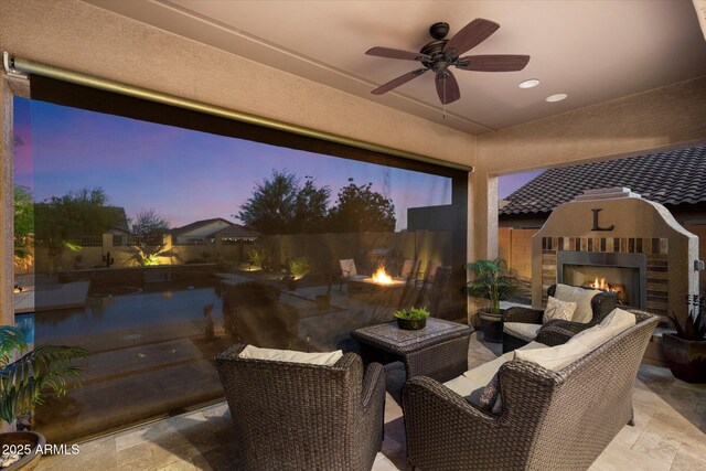 8733 E Jacaranda St, Mesa, AZ 85207 - view of patio with an outdoor living space with a fireplace, fence, and ceiling fan