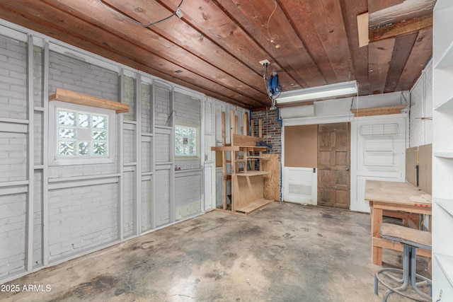 445 W 1st St, Mesa, AZ 85202 - misc room featuring unfinished concrete flooring, wooden ceiling, and a workshop area