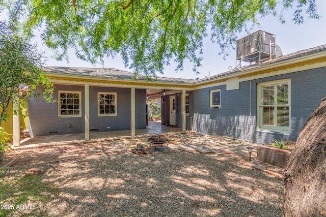 445 W 1st St, Mesa, AZ 85202 - back of house with brick siding, a patio, and a fire pit
