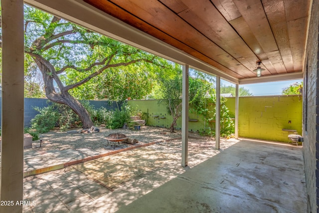 445 W 1st St, Mesa, AZ 85202 - fenced backyard featuring a fire pit and a patio area