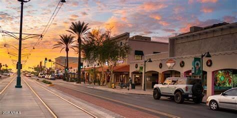 445 W 1st St, Mesa, AZ 85202 - view of asphalt street featuring sidewalks, street lights, and curbs