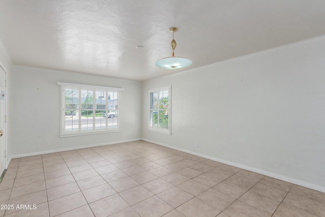 445 W 1st St, Mesa, AZ 85202 - empty room with light tile patterned flooring and baseboards