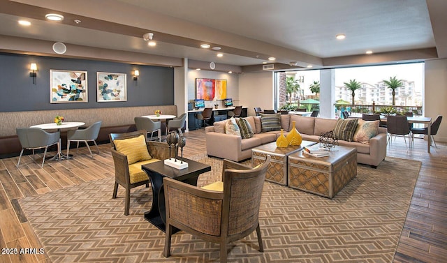 living area featuring recessed lighting, visible vents, and light wood-style flooring