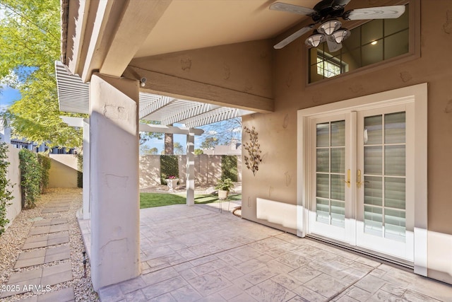 view of patio with a pergola, ceiling fan, and french doors