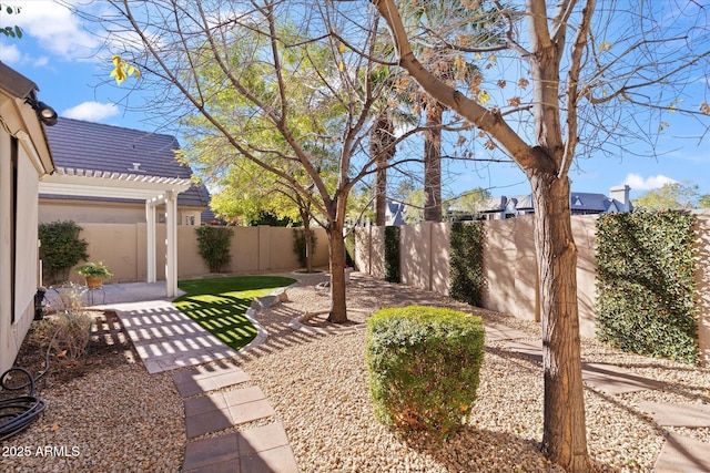 view of yard with a patio and a pergola