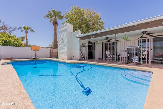 view of pool with ceiling fan