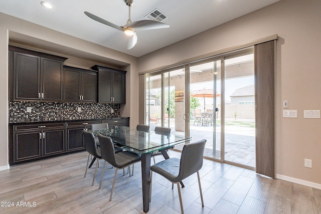 dining room featuring ceiling fan and light wood-type flooring