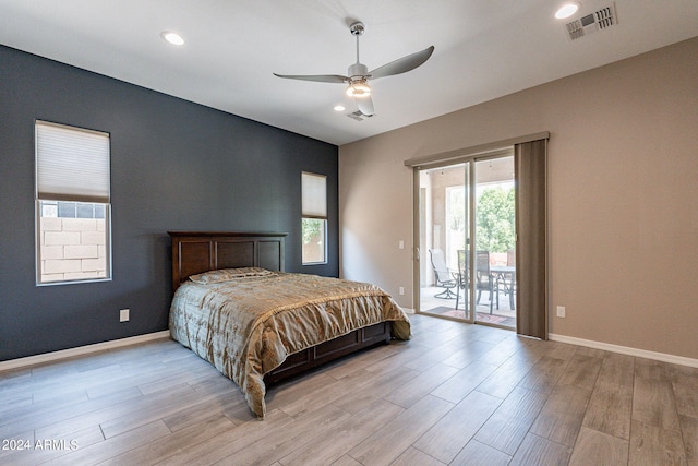 bedroom with access to outside, light hardwood / wood-style flooring, and ceiling fan