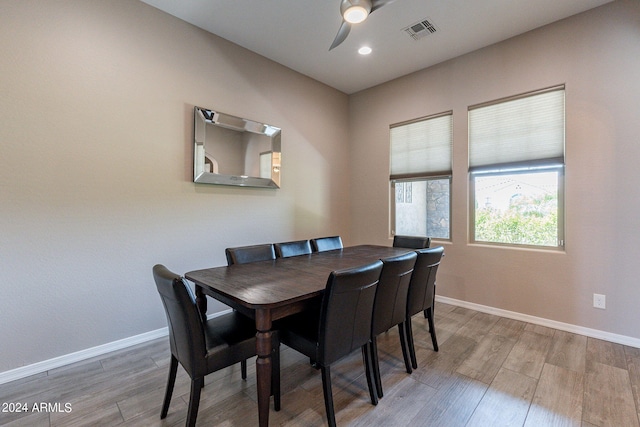 dining room featuring ceiling fan and light wood-type flooring