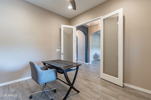 office area featuring french doors and light wood-type flooring