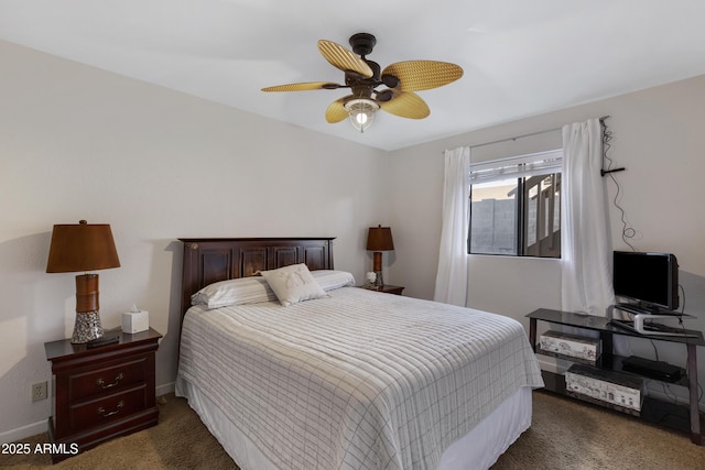 bedroom with dark carpet and ceiling fan