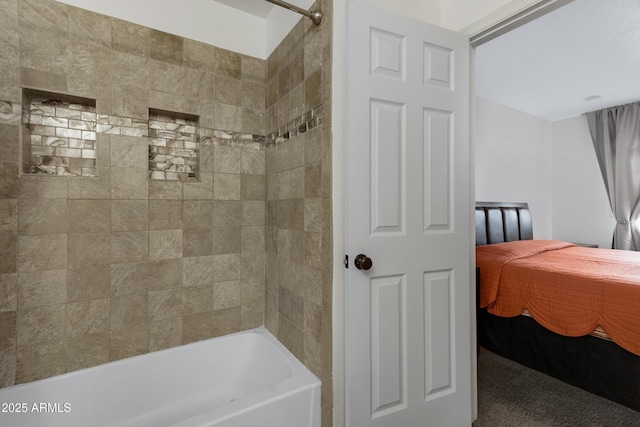 bathroom featuring tiled shower / bath combo