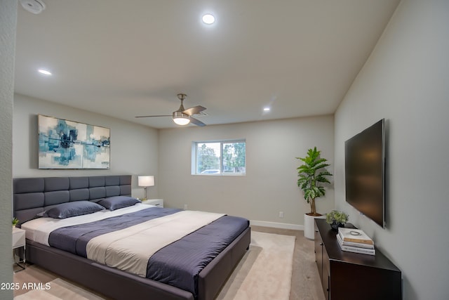 bedroom with baseboards, ceiling fan, light colored carpet, and recessed lighting