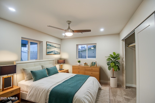 carpeted bedroom with visible vents, baseboards, ceiling fan, a closet, and recessed lighting