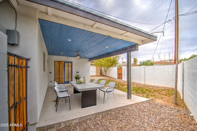 view of patio / terrace featuring a fenced backyard and a ceiling fan