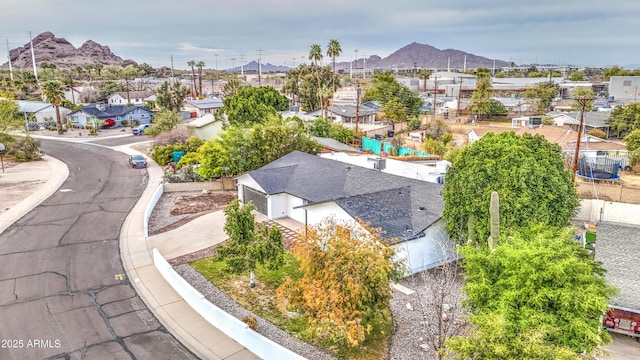 bird's eye view with a residential view and a mountain view