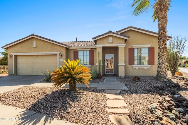 42609 W Milky Way, Maricopa, AZ 85138 - ranch-style home featuring driveway, stucco siding, a tile roof, and a garage