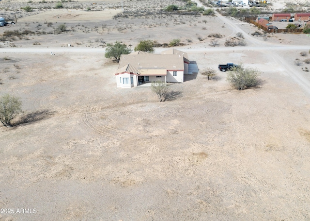 drone / aerial view featuring view of desert