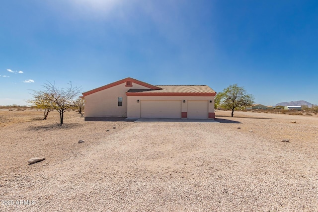 garage with driveway