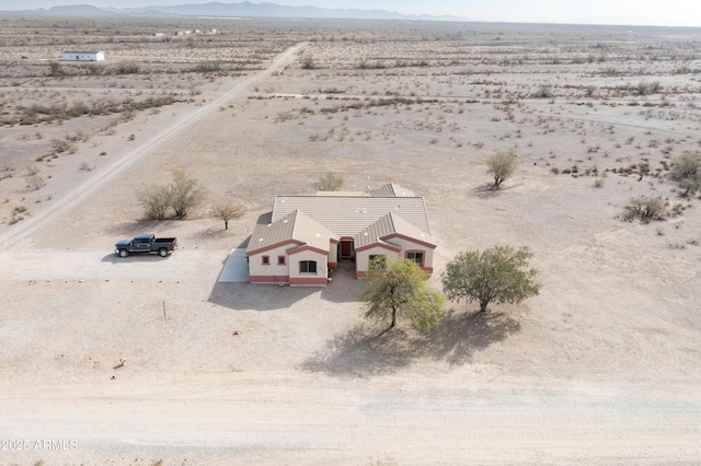 aerial view with view of desert and a mountain view