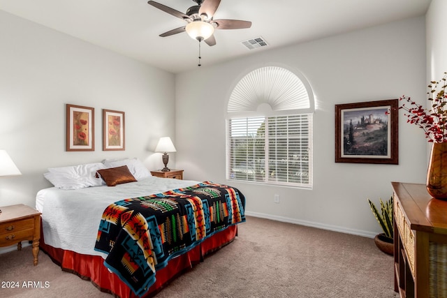 carpeted bedroom featuring ceiling fan