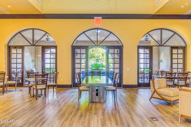 recreation room featuring light wood-type flooring and french doors