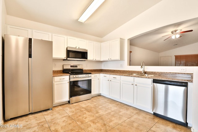 19002 N Toledo Ave, Maricopa, AZ 85138 - kitchen with stainless steel appliances, a sink, white cabinetry, lofted ceiling, and ceiling fan