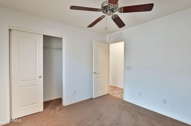 19002 N Toledo Ave, Maricopa, AZ 85138 - unfurnished bedroom with carpet, visible vents, a ceiling fan, a closet, and baseboards