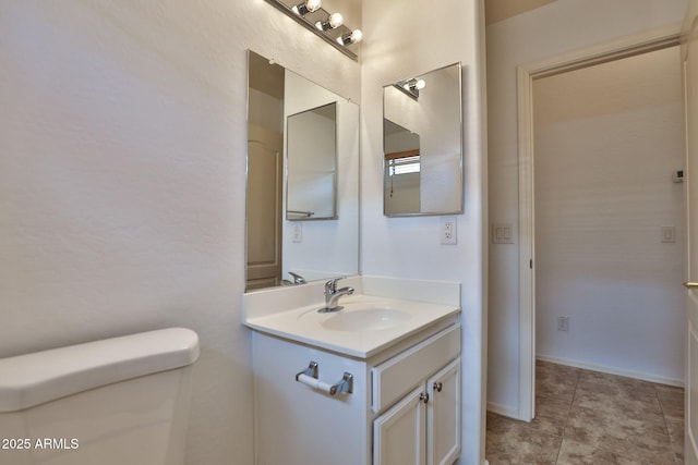 19002 N Toledo Ave, Maricopa, AZ 85138 - bathroom with tile patterned flooring, toilet, and vanity