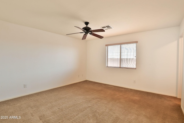 19002 N Toledo Ave, Maricopa, AZ 85138 - carpeted empty room featuring ceiling fan, baseboards, and visible vents