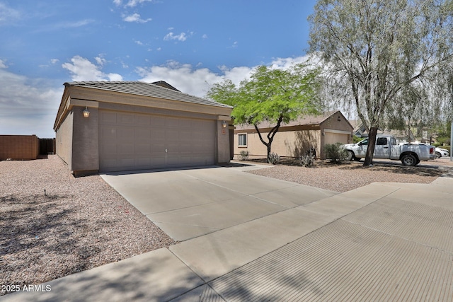 19002 N Toledo Ave, Maricopa, AZ 85138 - single story home with stucco siding, a tile roof, driveway, and a garage