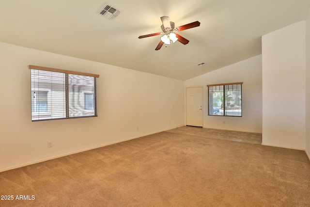 19002 N Toledo Ave, Maricopa, AZ 85138 - spare room with lofted ceiling, visible vents, light colored carpet, and ceiling fan