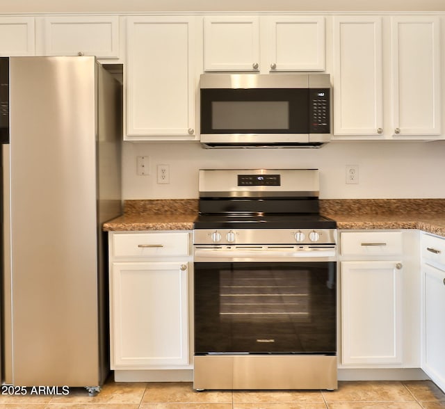 19002 N Toledo Ave, Maricopa, AZ 85138 - kitchen featuring white cabinets, appliances with stainless steel finishes, and light tile patterned flooring