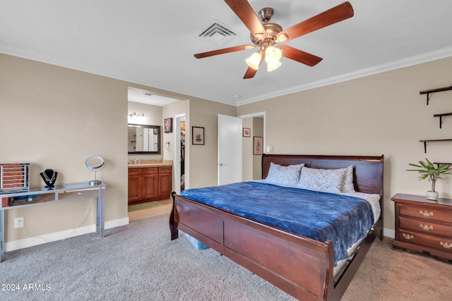 bedroom with light carpet, sink, ensuite bathroom, ornamental molding, and ceiling fan