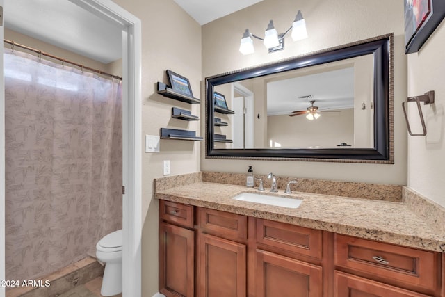 bathroom with ceiling fan, vanity, and toilet