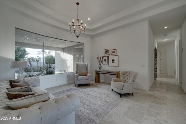 living room featuring a raised ceiling