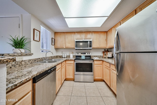 5757 W Eugie Ave Unit 2068, Glendale, AZ 85304 - kitchen featuring stainless steel appliances, light brown cabinets, a sink, light tile patterned floors, and light stone counters